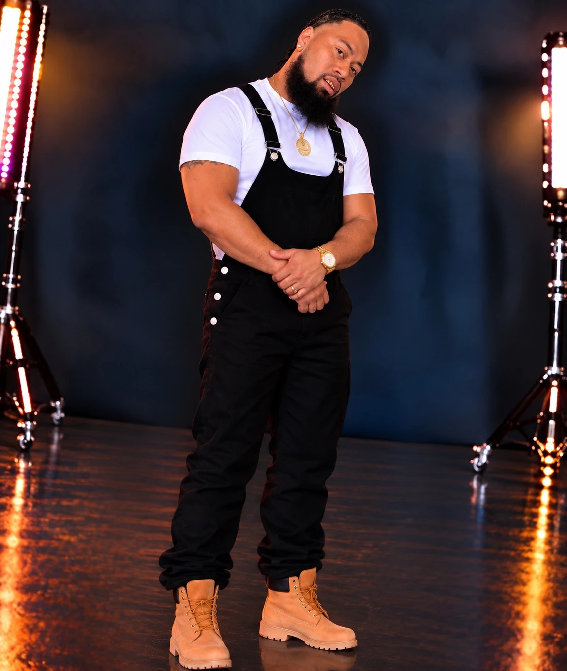 Cash Prince June in black overalls, white tee and tan boots